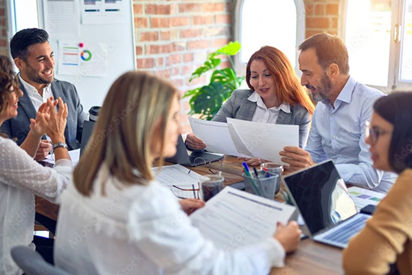 Students taking notes in a classroom