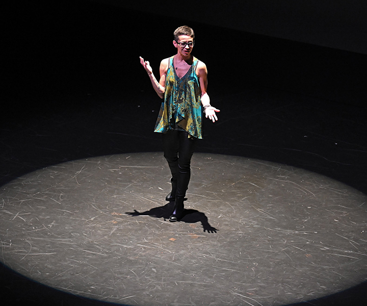 A Picture of for ACT of one of the dance teachers on a stage